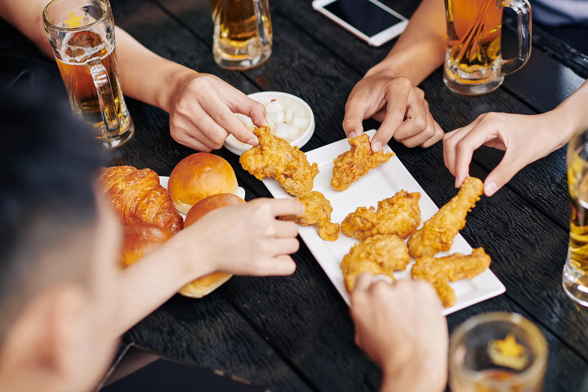 people eating chicken